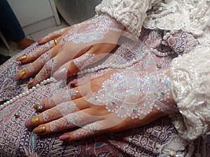 beautiful henna on the hands of the bride