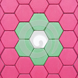 Beautiful Hexagonal brick flooring background pattern in the park