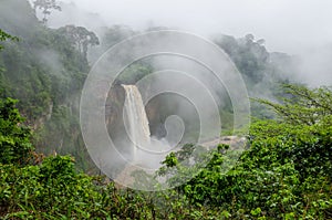 Beautiful hidden Ekom Waterfall deep in the tropical rain forest of Cameroon, Africa