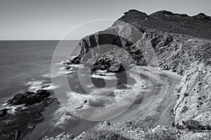 Beautiful high angel shot of Los Amarillos landscape in Cabo de Gata, Spain in grayscale photo