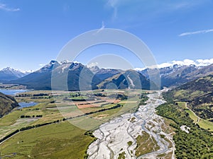 Beautiful high angle aerial view of Rees River, Mount Earnslaw and the Glenorchy-Paradise Road near Glenorchy