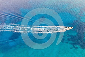 Beautiful high angle shot of a ship engine trail in the ocean