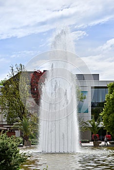 Beautiful and high fountain in the European city of Baden-Baden Augustaplatz photo
