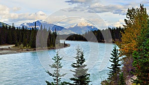 Beautiful high mountains of the Canadian Rockies and an alpine river along the Icefields Parkway between Banff and Jasper