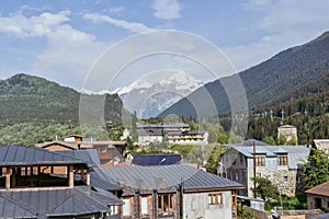Beautiful highland townlet Mestia in the Svaneti region, Georgia, Asia. Cityscape view of traditional rural houses with