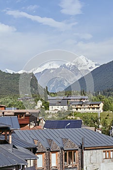 Beautiful highland townlet Mestia in the Svaneti region, Georgia, Asia. Cityscape view of traditional rural houses with