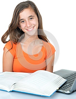 Beautiful hispanic teenage girl studying