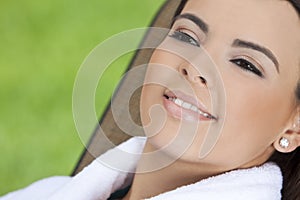 Beautiful Hispanic Woman in Bathrobe at Health Spa photo