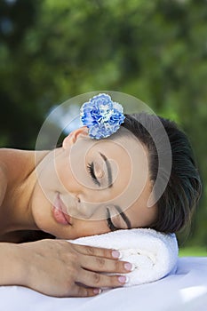 Beautiful Hispanic Woman Relaxing At Health Spa