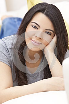 Beautiful Hispanic Woman Relaxing & Smiling