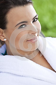 Beautiful Hispanic Woman in White Bathrobe At Spa photo