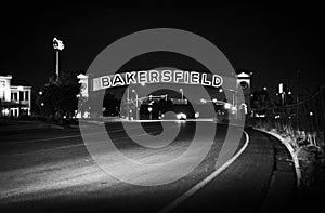 Beautiful historic Bakersfield sign lit up at night in black and white