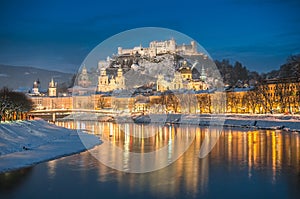 Beautiful historic city of Salzburg in winter at night, Austria