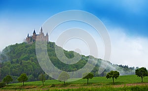 Beautiful Hohenzollern castle in haze at summer photo