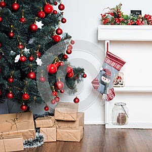 Beautiful holdiay decorated room with Christmas tree and presents under it. New Year decorations