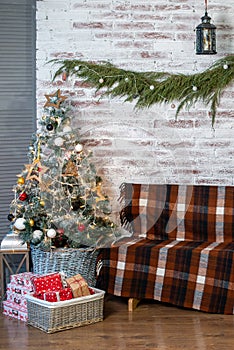 Beautiful holiday decorated room with Christmas tree and with presents. Cozy winter scene