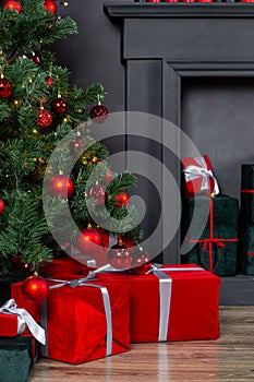 Beautiful holiday decorated room with Christmas tree with presents under it