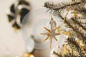 Beautiful holiday decorated room with Christmas tree with presents under it