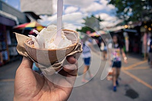 Beautiful holiday eating coconut organic ice-cream