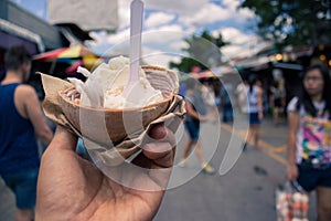 Beautiful holiday eating coconut organic ice-cream