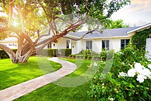 Beautiful Home With Green Grass Yard photo