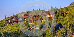 Beautiful homes in sunset light Park City pano