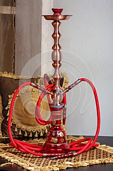 Beautiful hookah standing on a table in the eastern interior