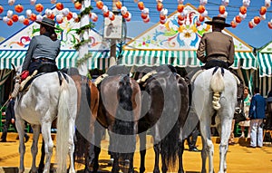 beautiful horses with their riders at the Feria de Abril in Seville,Andalusia,Spain