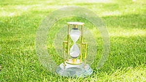 Beautiful hourglass stand against the background of beautiful nature