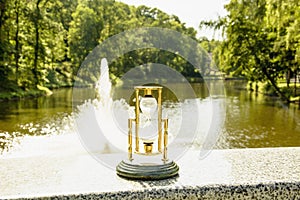 Beautiful hourglass stand against the background of beautiful nature