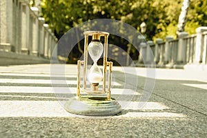 Beautiful hourglass stand against the background of beautiful nature