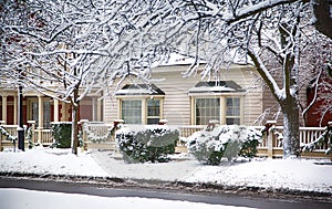 Beautiful house covered snow located in the Queen Street, Niagara on the Lake, Canada