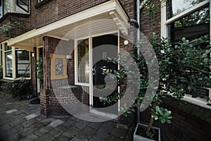 Beautiful house facade. Black door and surrounding architecture, Holland.