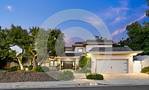 Beautiful house with trees in the yard and driveway in Encino, California