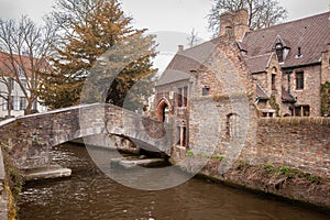 Beautiful houses along the canals of Brugge, Belgium. Tourism destination in Europe