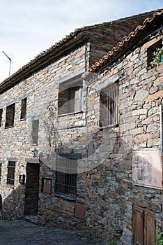 Beautiful houses in Patones de Arriba, Madrid. Traditional stone walls photo