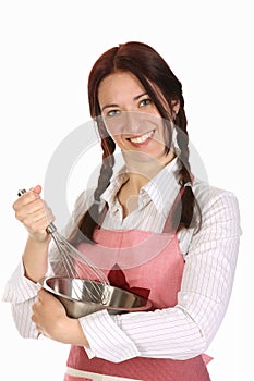 Beautiful housewife preparing with egg beater