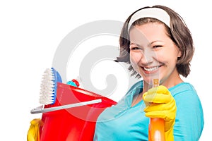 Beautiful housewife smiling directs the spray photo