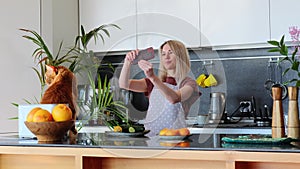 Beautiful housewife taking selfie while recording video vlog food blogger delicious vegan food recommend stay at home