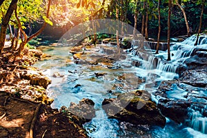 Beautiful of Huai mae khamin waterfall Srinakarin national park at Kanchanaburi thailand. Waterfall clear emerald water on autumn