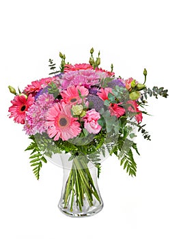 Beautiful huge bouquet of pink gerberas, chrysanthemums and lisianthus in vase on white background