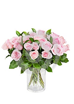 Beautiful huge bouquet of pink roses in vase isolated on white background