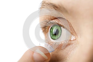 Beautiful human eye and contact lens isolated