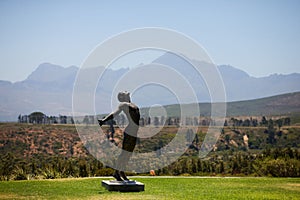 Beautiful human statue with mountains in the background at the Idiom Wine Estate in South Africa