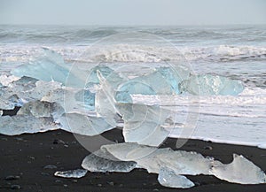 Beautiful Icebergs on the Black Sand Beach of South Iceland