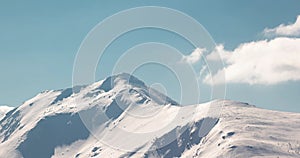 Beautiful icy snowy mountain peak in romania