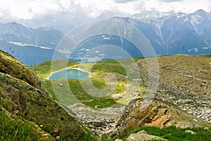 Beautiful idyllic Alps landscape with lake and mountains in summer