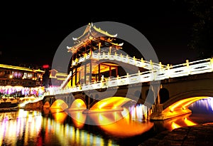 Beautiful illuminated bridge at fenghuang ancient