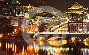 Beautiful illuminated bridge at fenghuang ancient