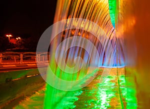 Beautiful illuminated colorful fountain at night time